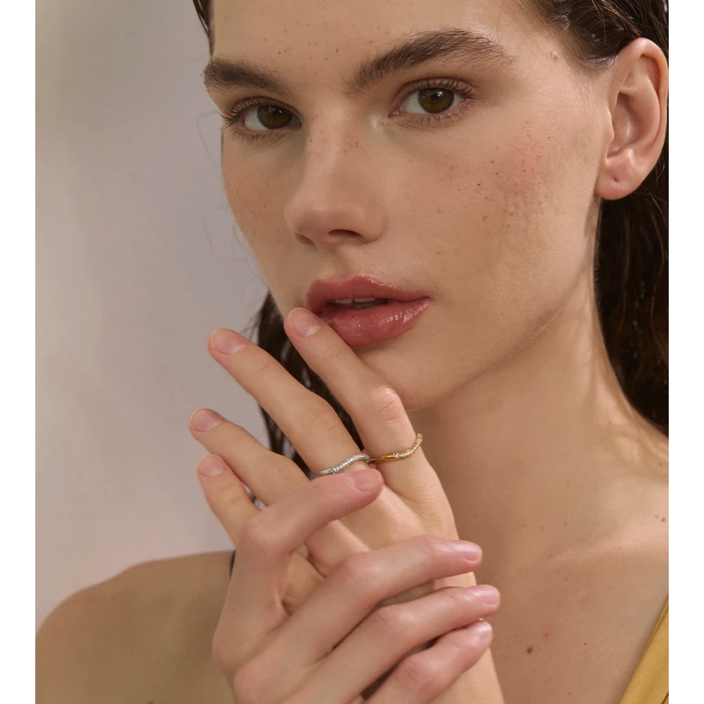 Adjustable open band ring with elegant layering potential among rings gold rings