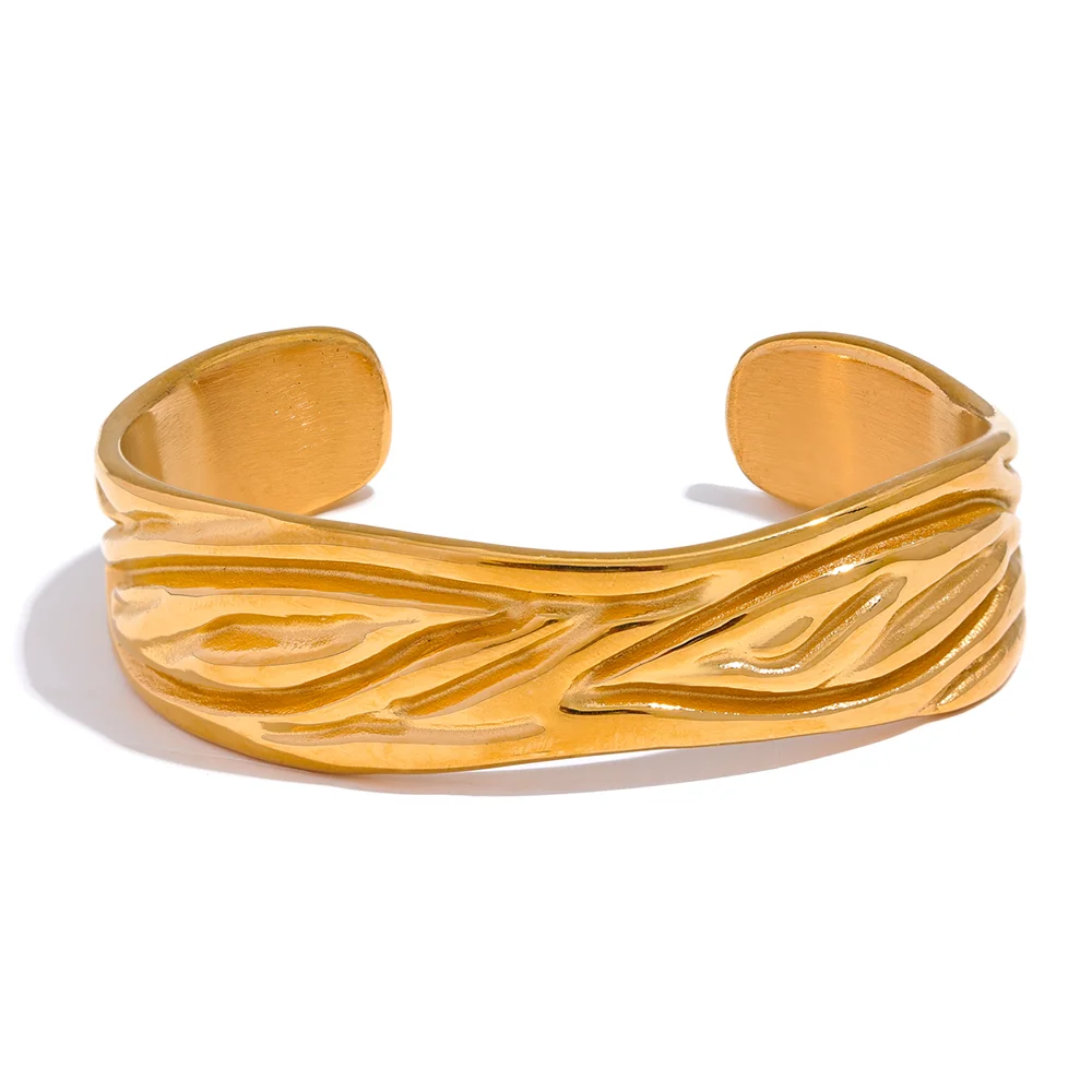 Golden cuff bracelet styled as a sleek cuff bracelet for daily wear