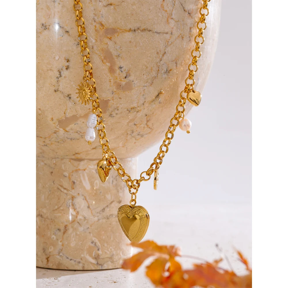 Close view of necklace pearl centerpiece paired with a delicate pearl bracelet