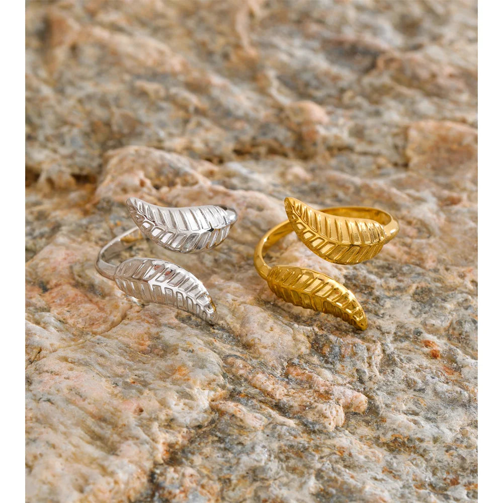 Gold a ring with textured leaf pattern