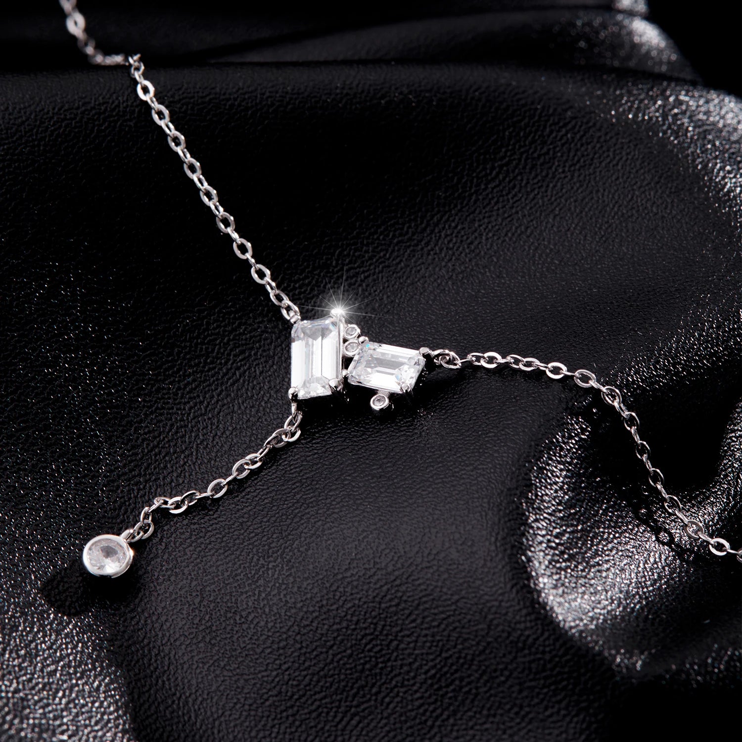 Sterling silver lariat jewelry featuring rectangle CZ links