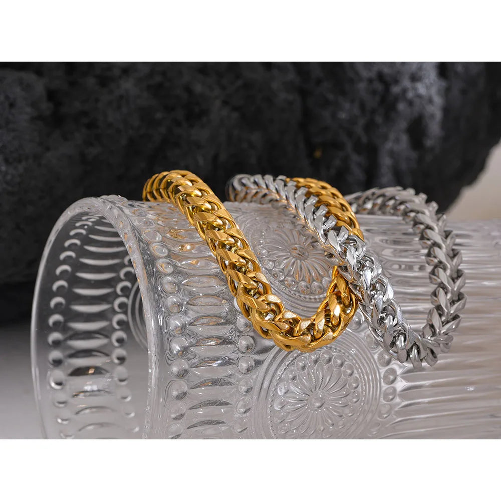 Chain bracelet for men shown with a bold gold chain bracelet finish