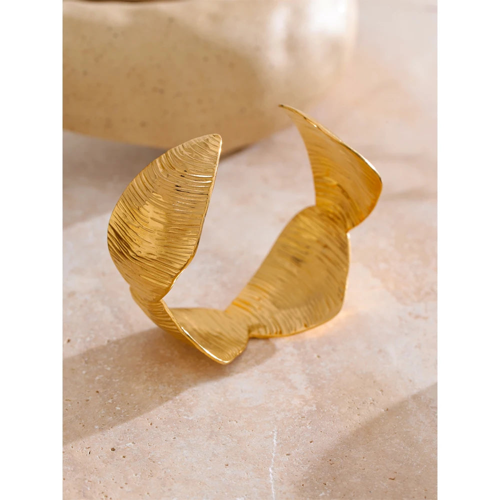 Wrist shot showing waterproof jewelry bangle with subtle shine