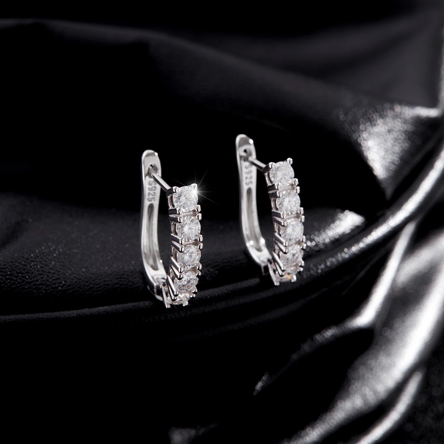 Moissanite earrings with D-Color stones set in U-shape hoops