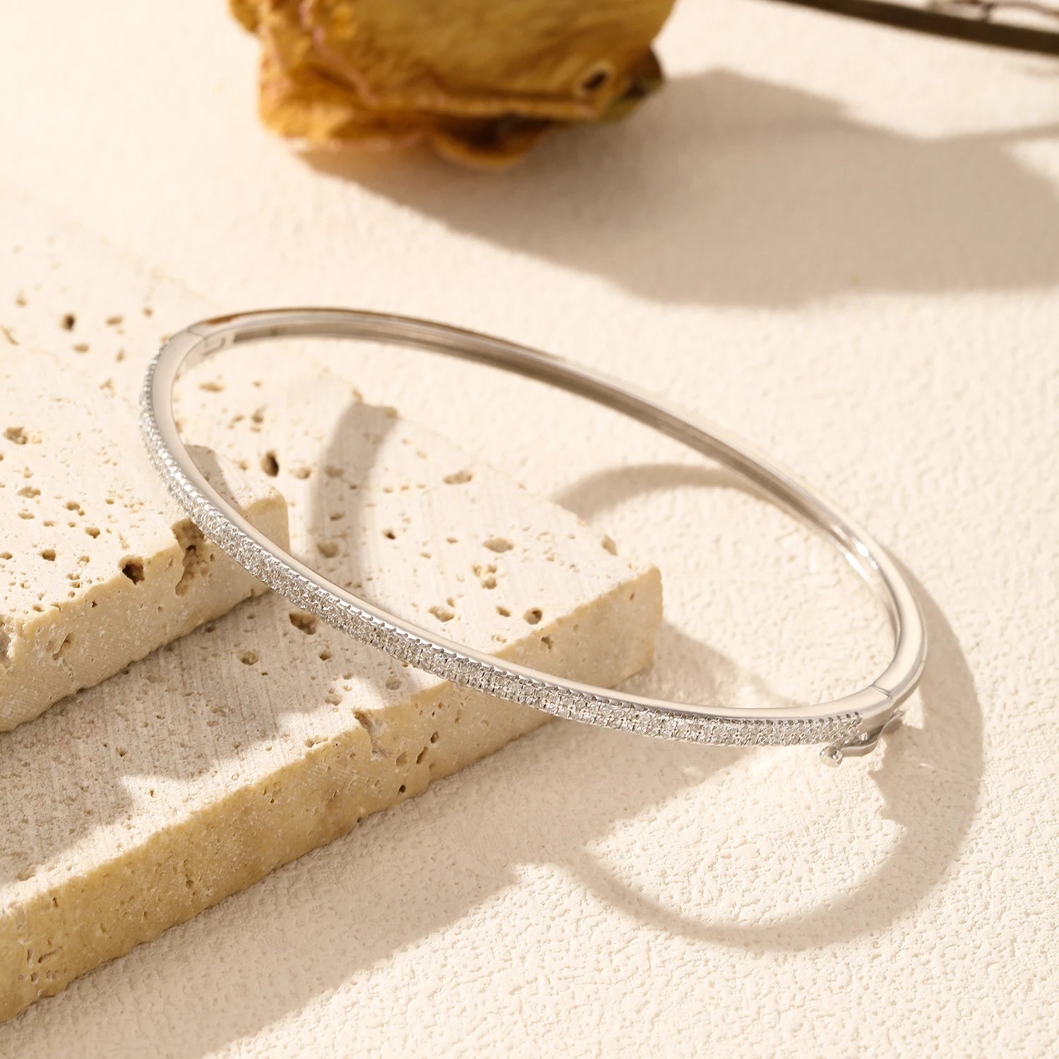 Sterling silver bracelet with dazzling CZ in classic bangle form