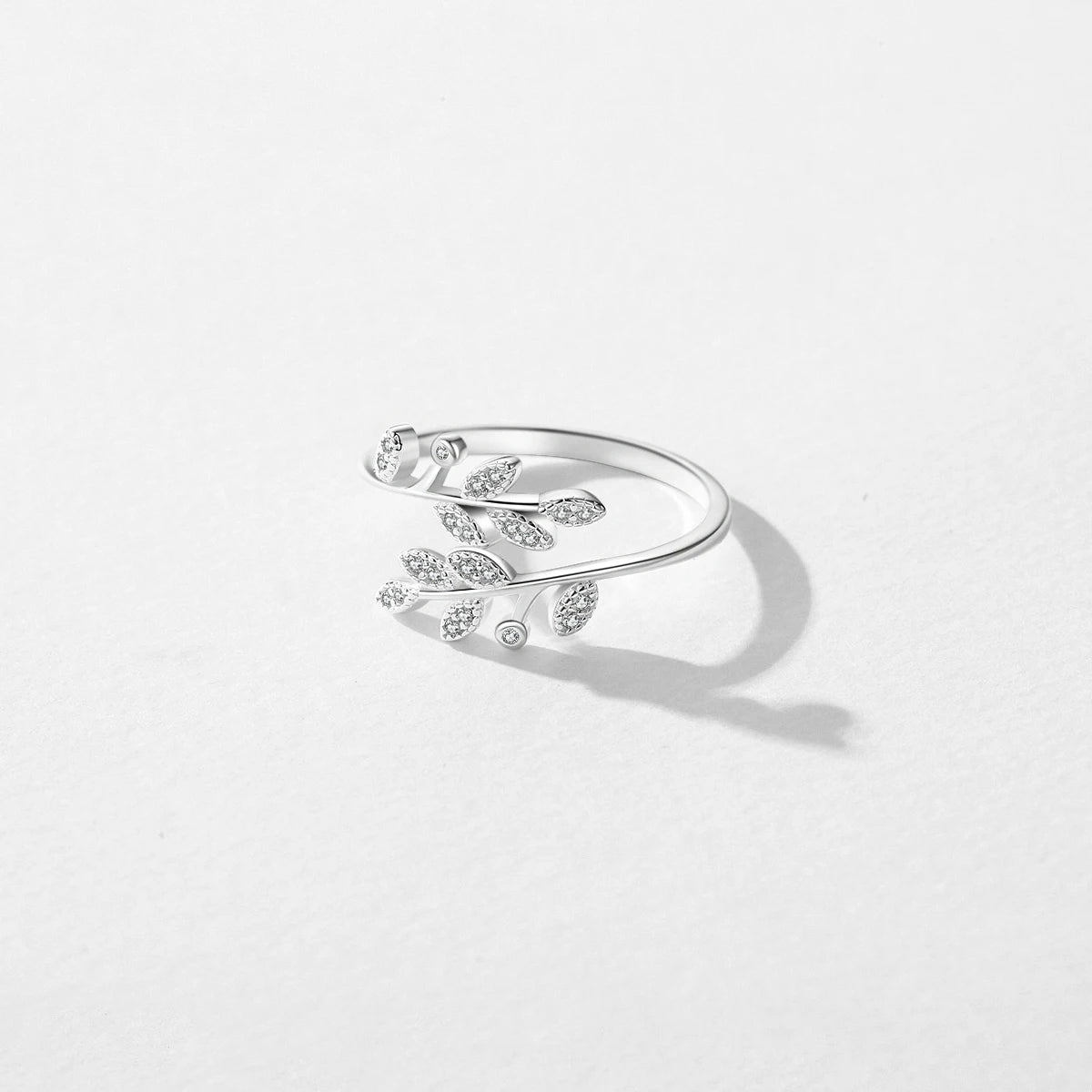 Elegant sterling ring styled beside coordinating cz rings