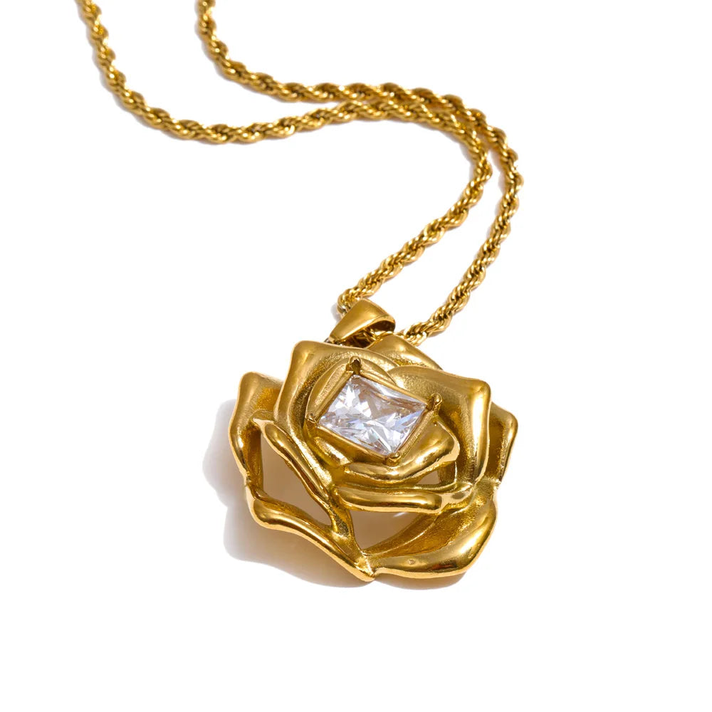 Jewelry set featuring gold and earrings with cubic zirconia accents