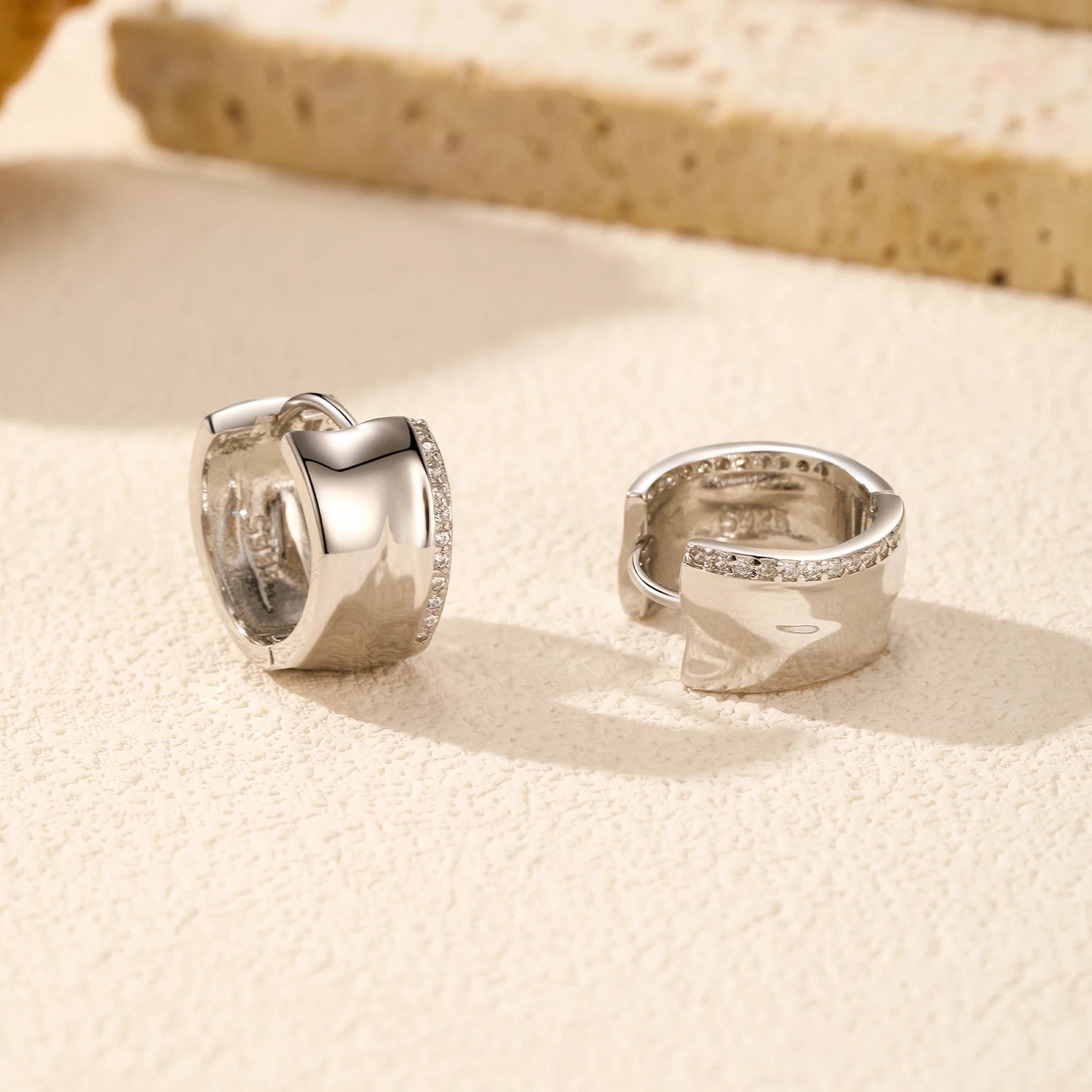 Sterling silver hoop earrings styled as hoop earrings for women