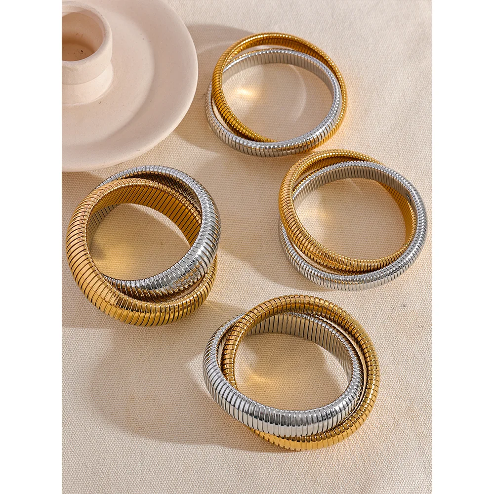 Bracelet for gold stacked beside a matching bracelet gold bracelet