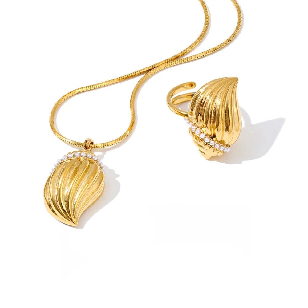 Ocean conch pendant on necklace with matching ring set and necklace pearls shine