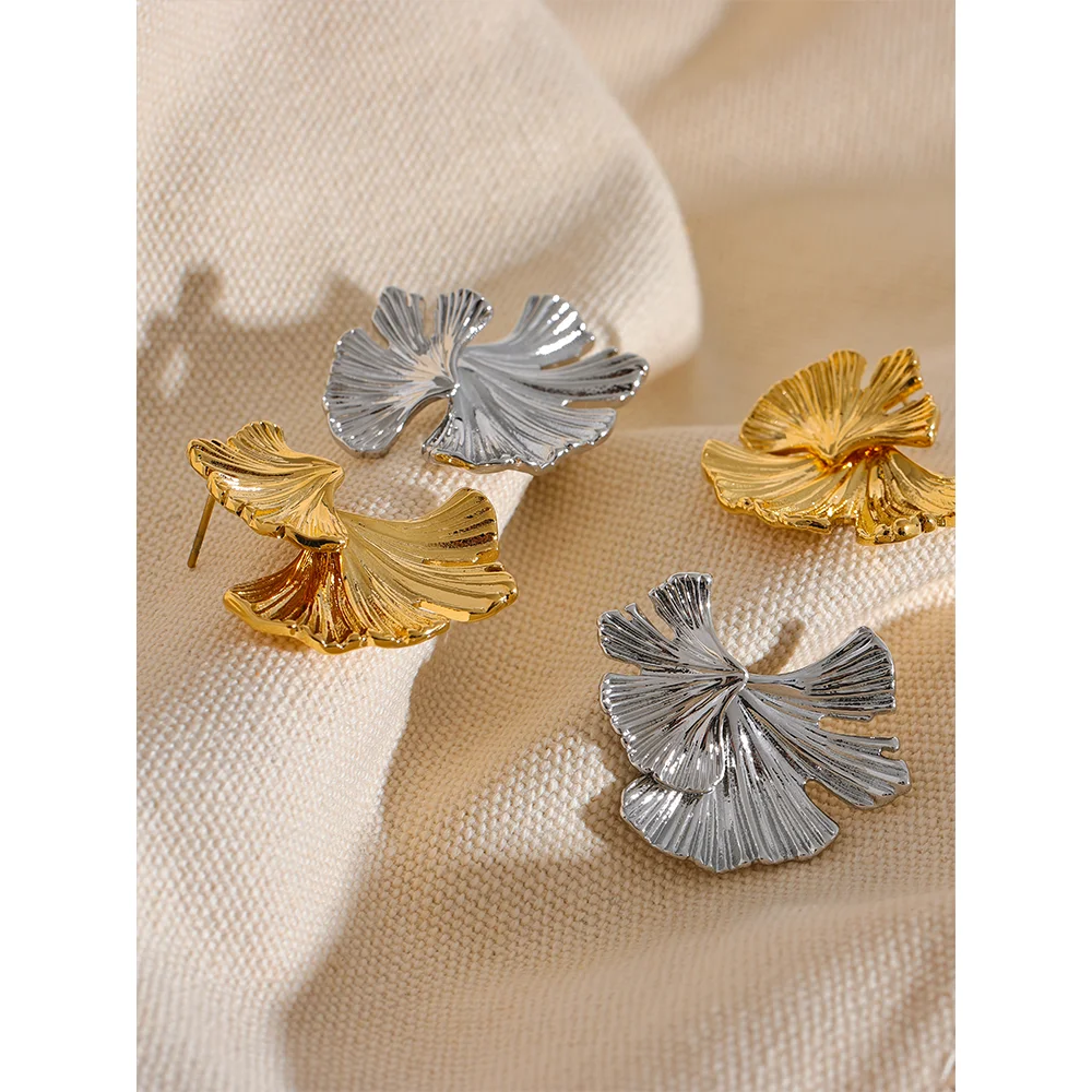 Earrings gold earrings with nature inspired leaf design