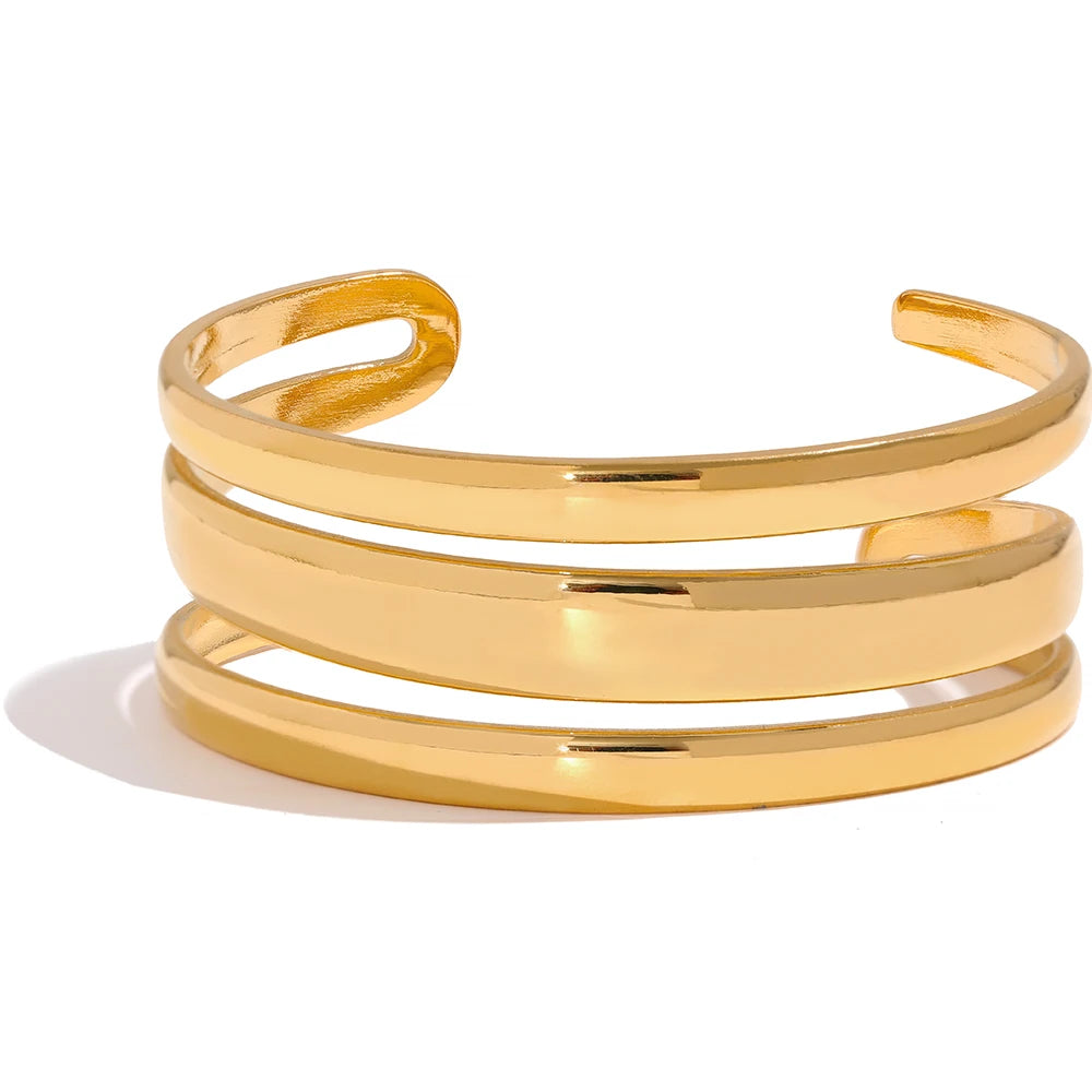 Gold cuff bracelet shown as a bracelet with gold for a bold finish