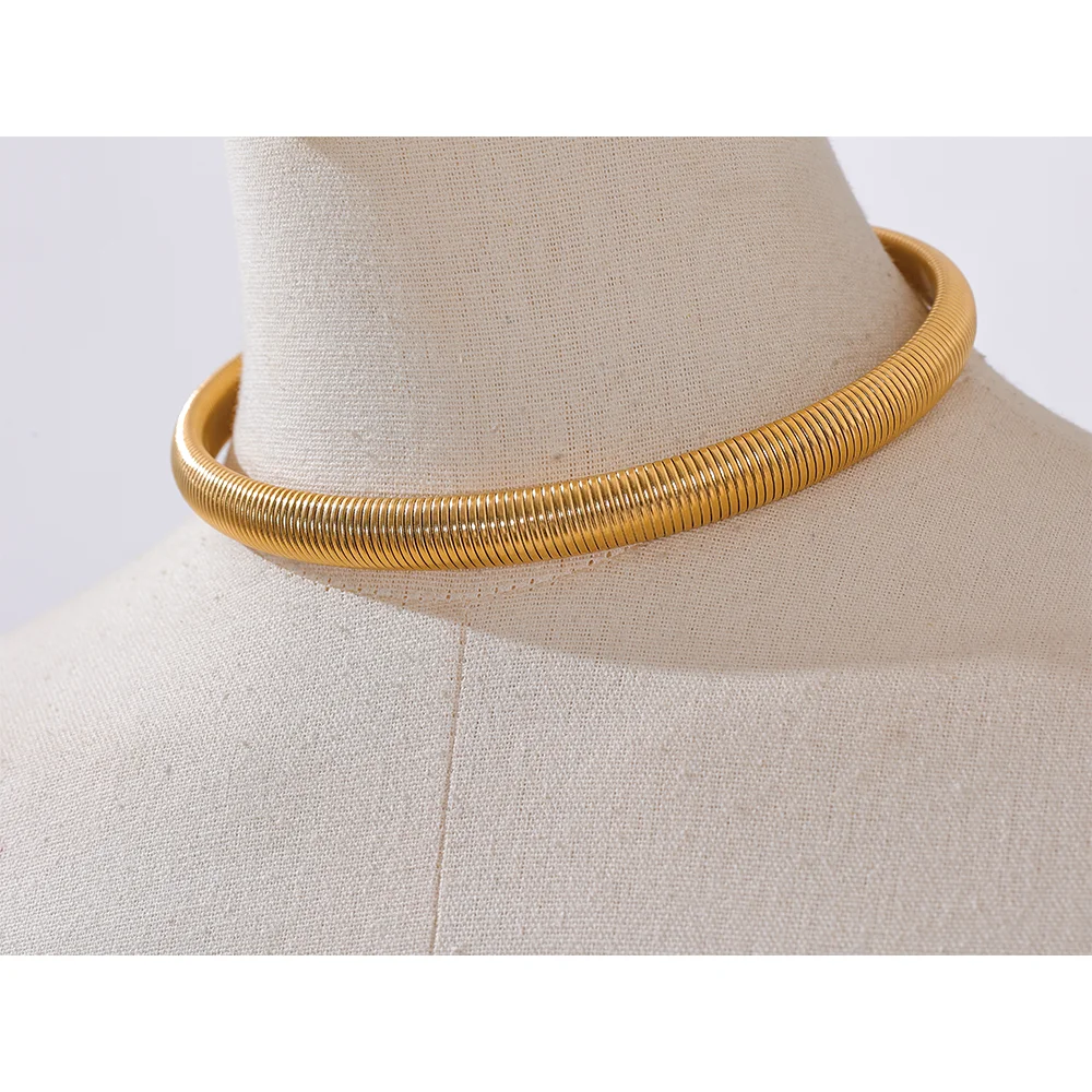 Silver tone elastic torque necklace stainless steel bold width