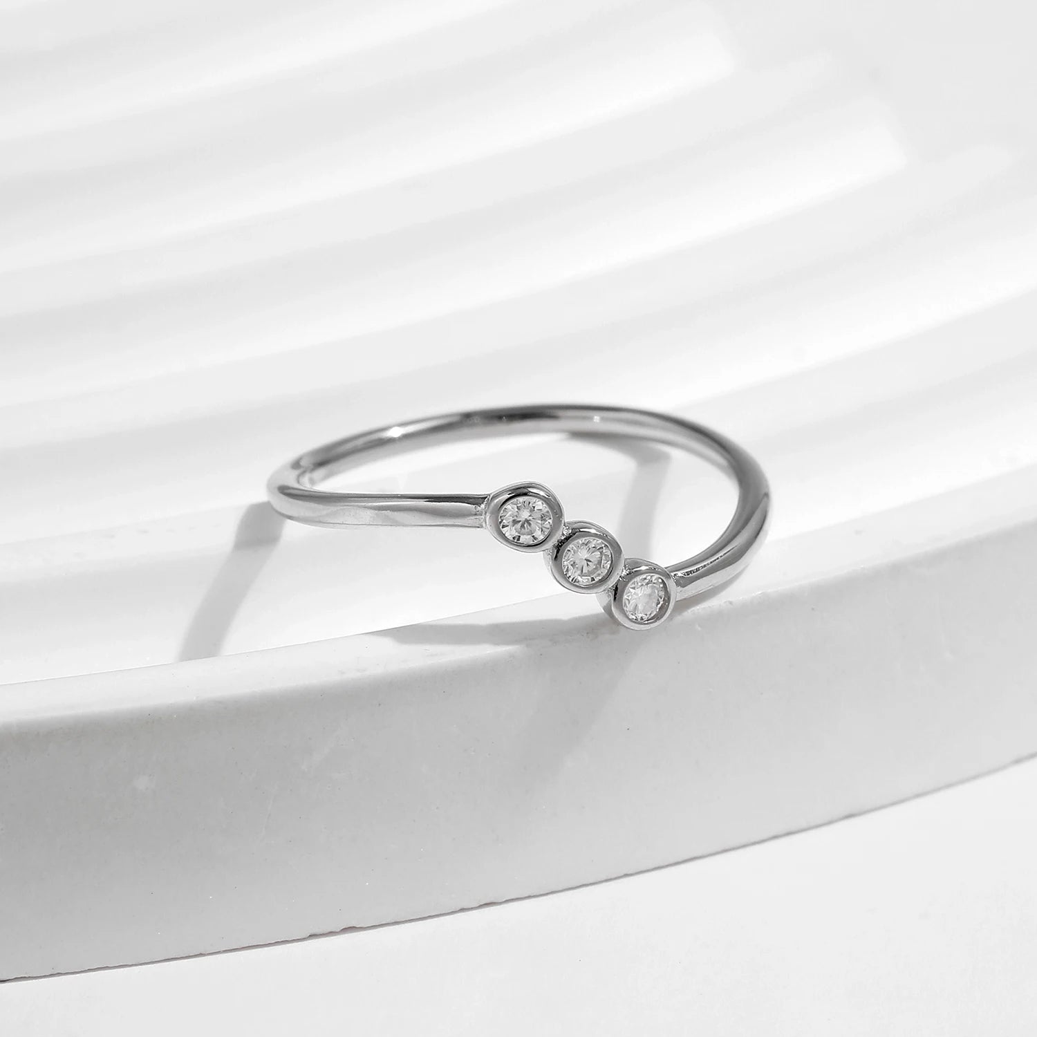 Close view of moissanite ring with ring with size interior