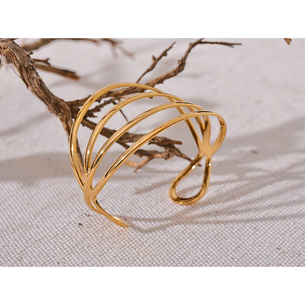 Cuff bracelet for ladies in gold crafted from stainless steel
