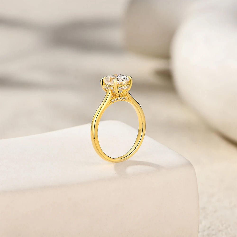 Close view of moissanite ring showing oval ring sparkle and ring size details