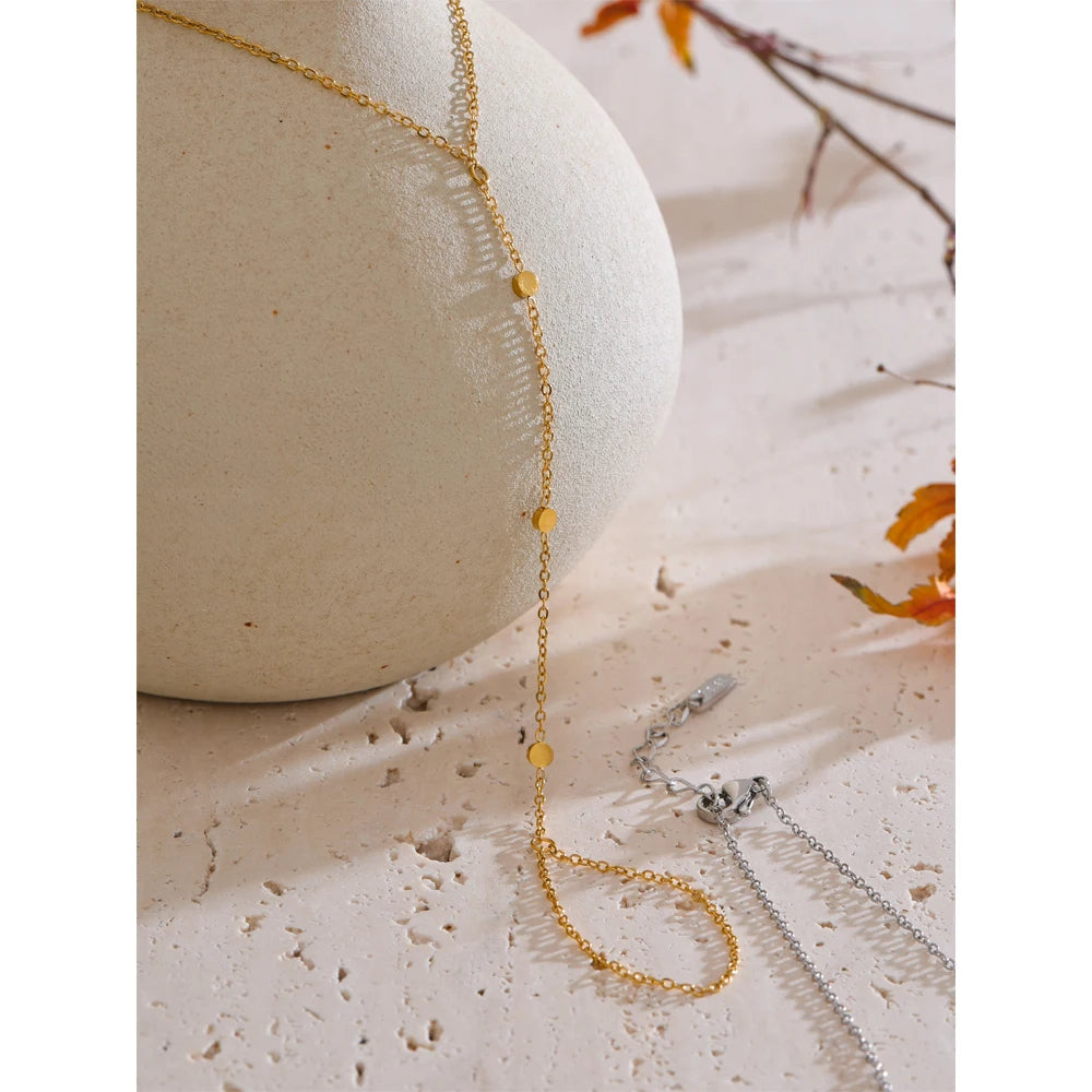 Elegant chain with hand silhouette showing refined bracelet chain detail