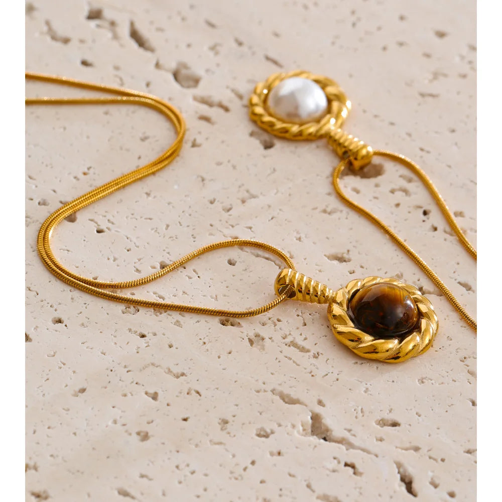 Necklace and necklace style featuring tiger eye stone and pearl