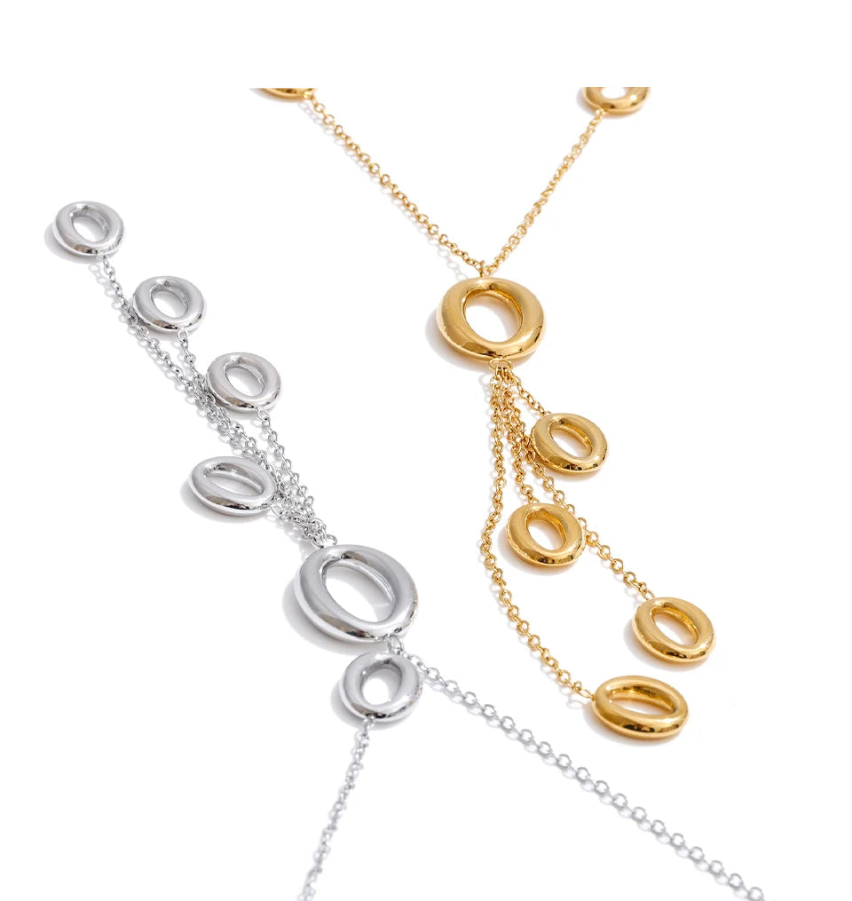 Closeup of gold plated tassel pendant necklace accessory