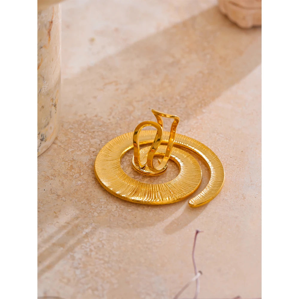 Minimal stainless steel jewelry ring with bold texture and elegant shine