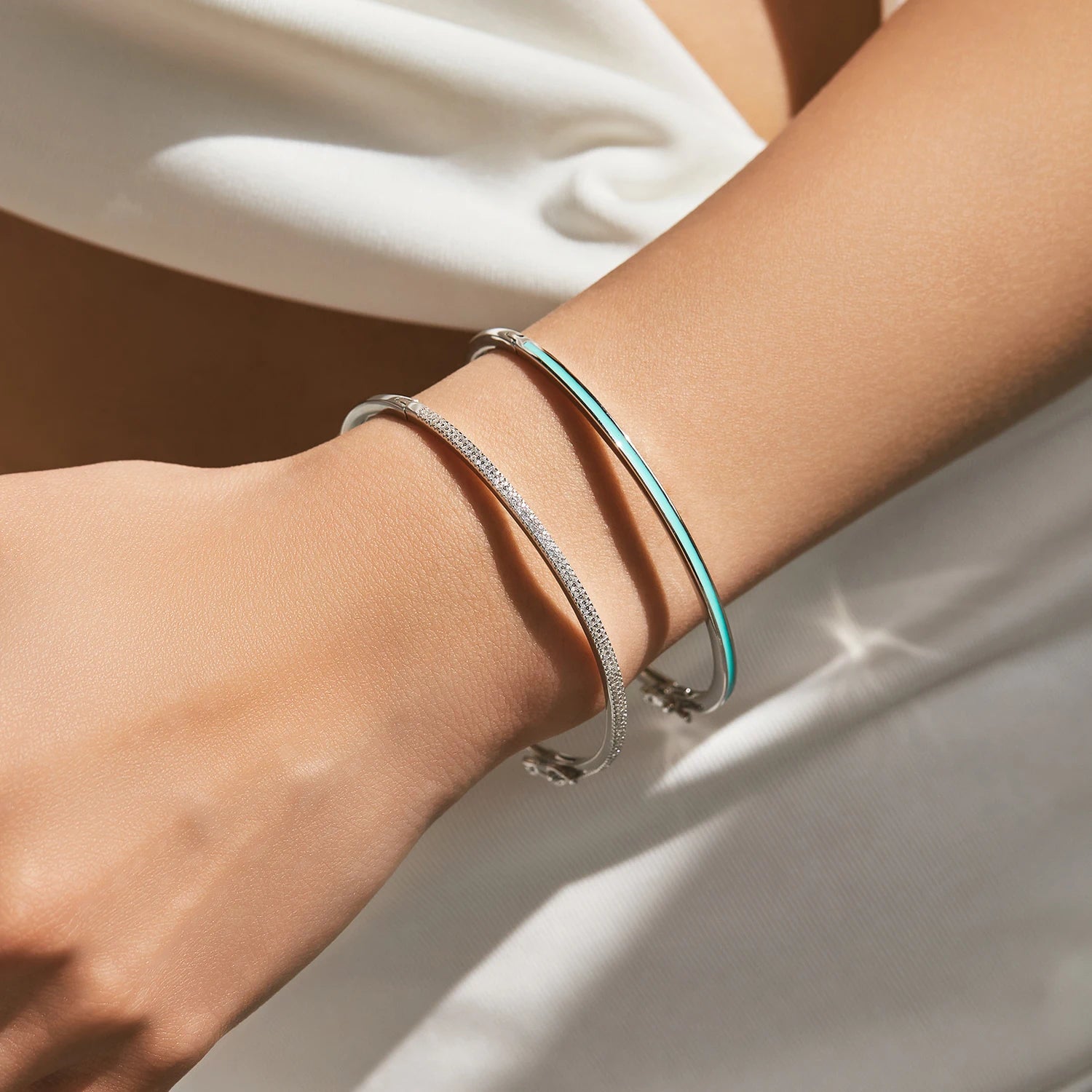 925 sterling silver bracelet styled as a polished silver bangle