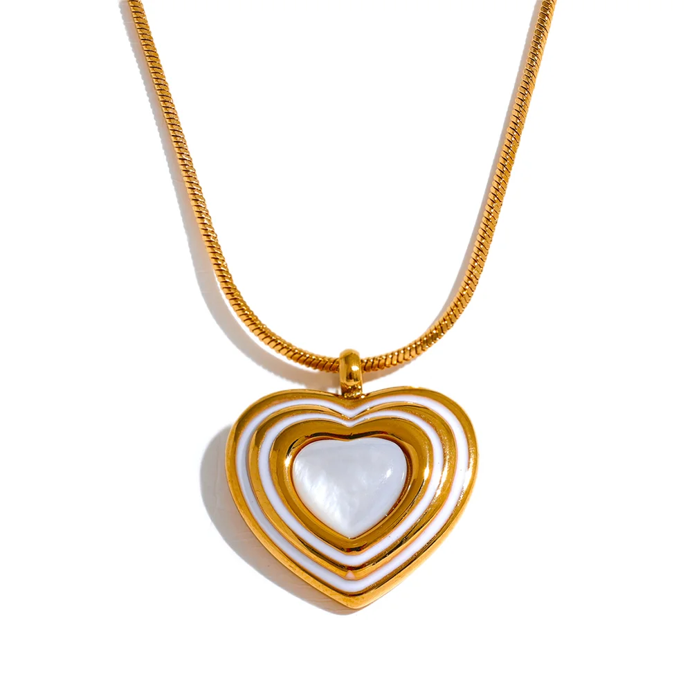 Heart shell pendant on a gold chain styled as a radiant heart necklace