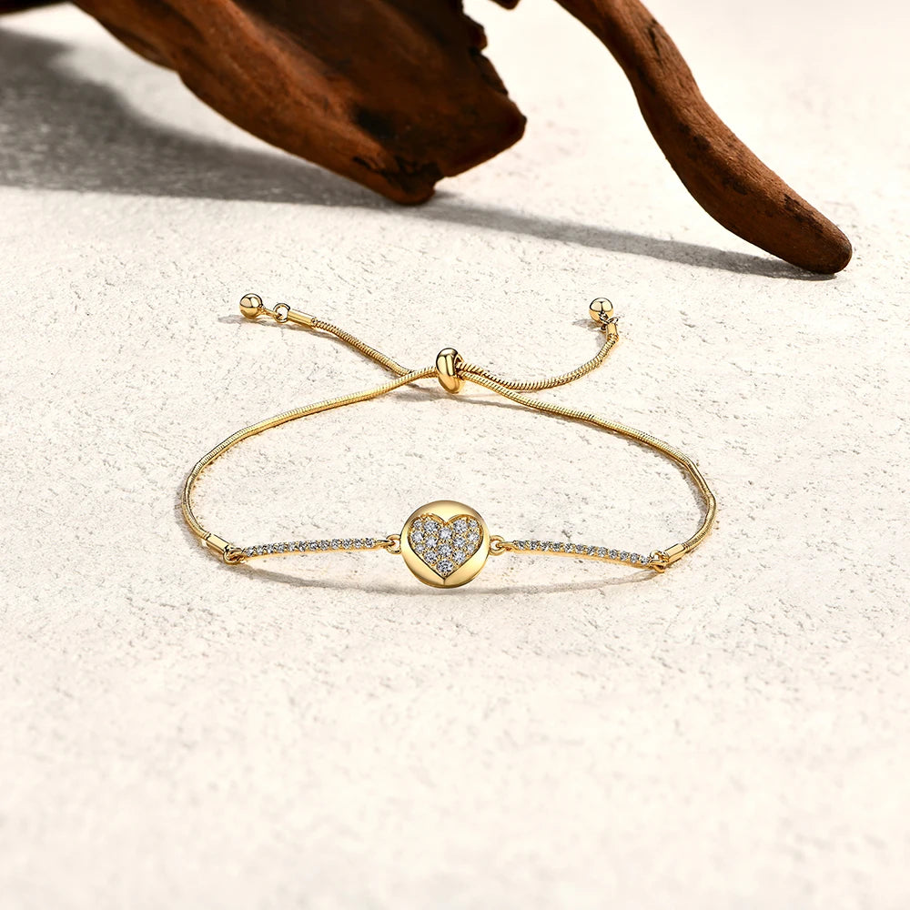 Bracelet with gold accent showing a refined gold heart centerpiece
