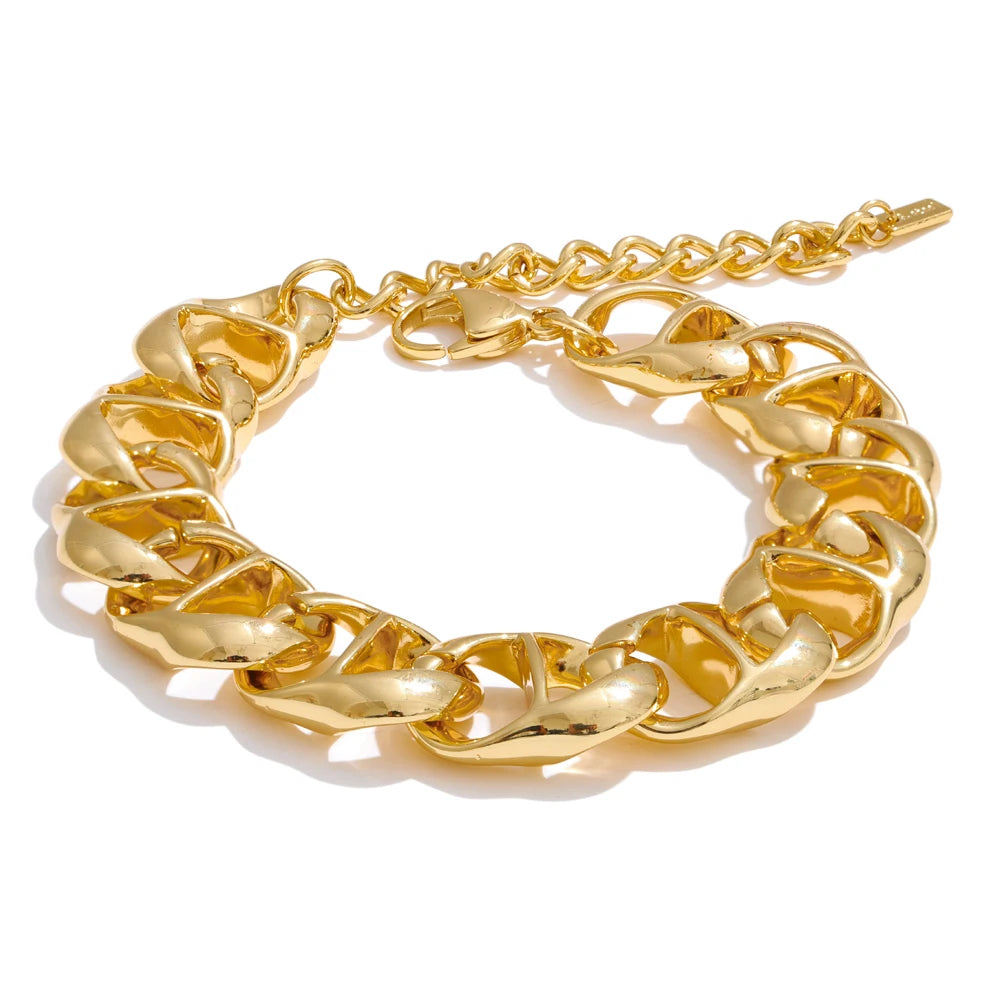 Lifestyle shot layering bracelet bracelets with a wide chain centerpiece