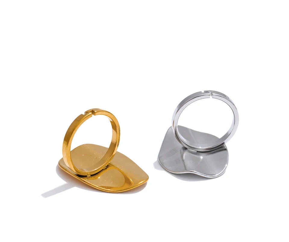 Stainless steel jewelry ring with silver color sheen and gold ring warmth