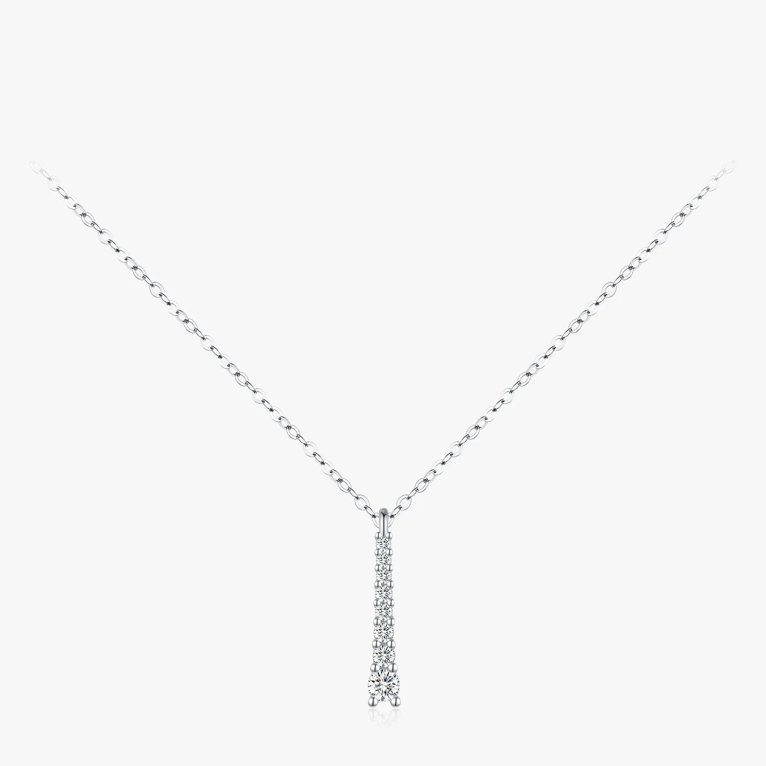 Silver necklace styled for necklace and necklace layering with moissanite