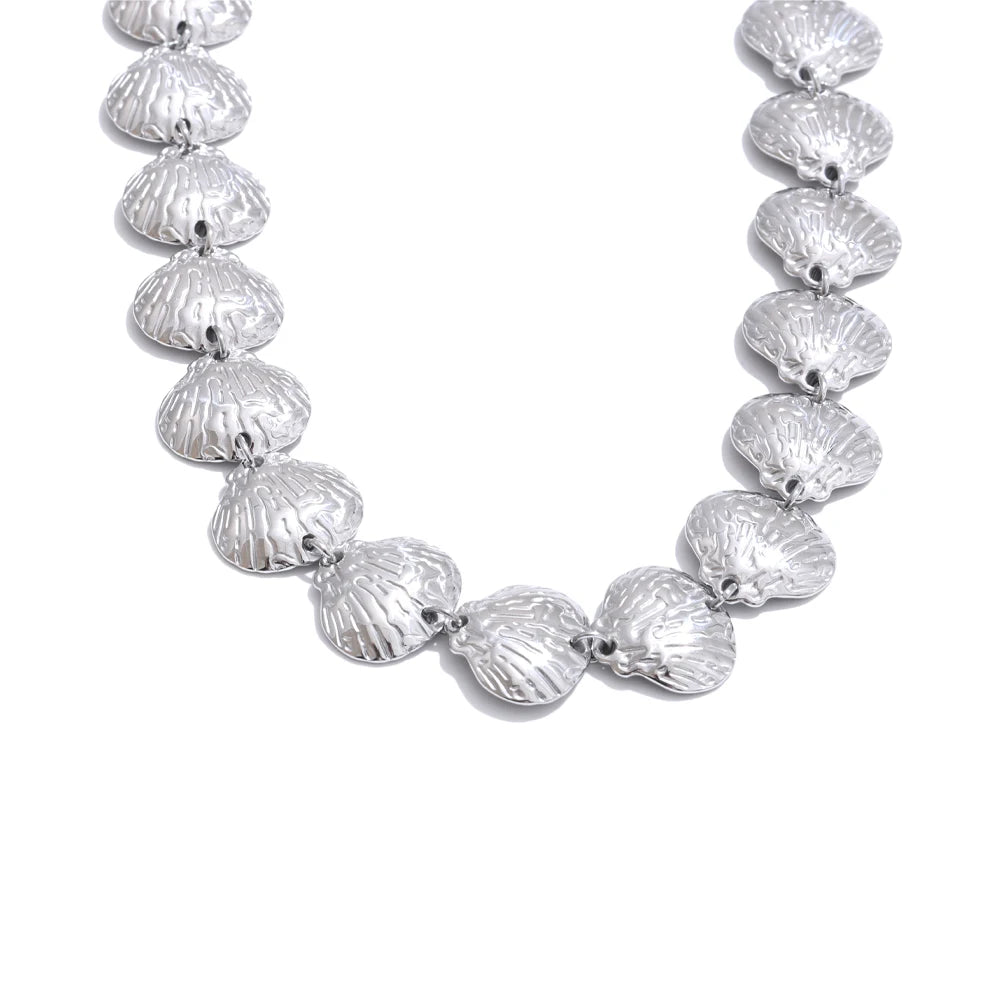 Jewelry store inspired gold in chain design with bracelet and necklace