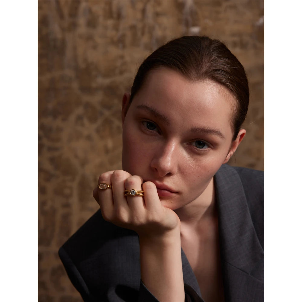 Elegant stack mixing cz rings with a cubic zirconia centerpiece