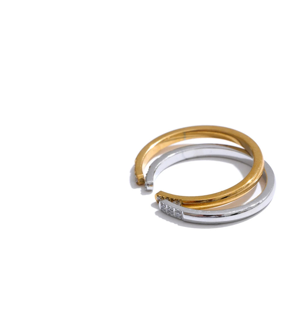Side angle of the adjustable open ring showing sleek band and stone alignment