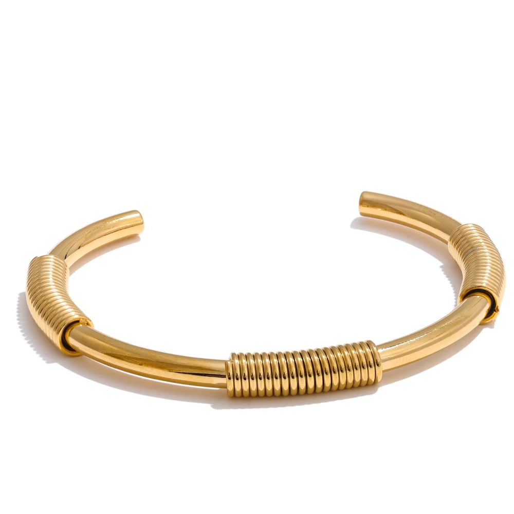 Elegant mix of bracelet bracelets including a bracelet with gold tone cuff