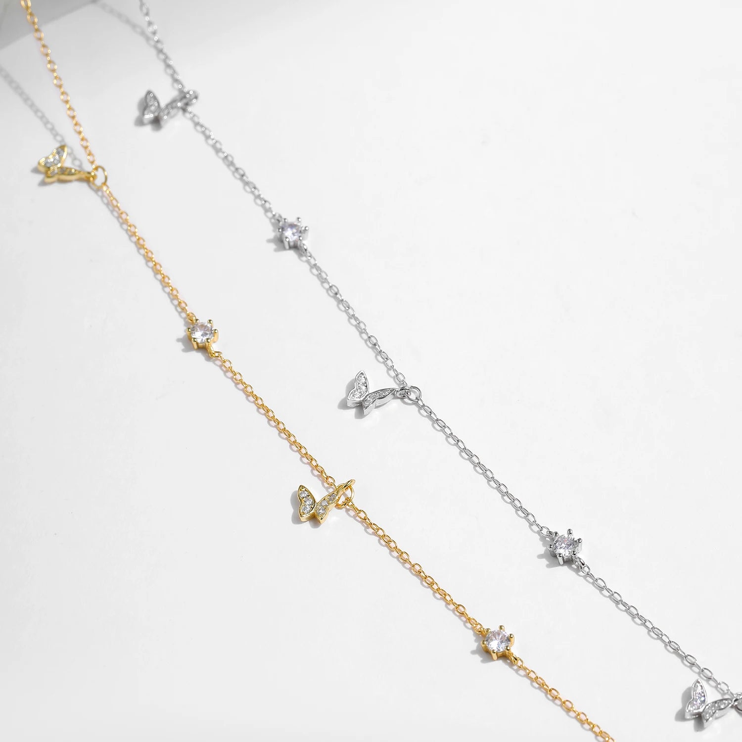 Sterling silver necklace layered with a slim silver chain look