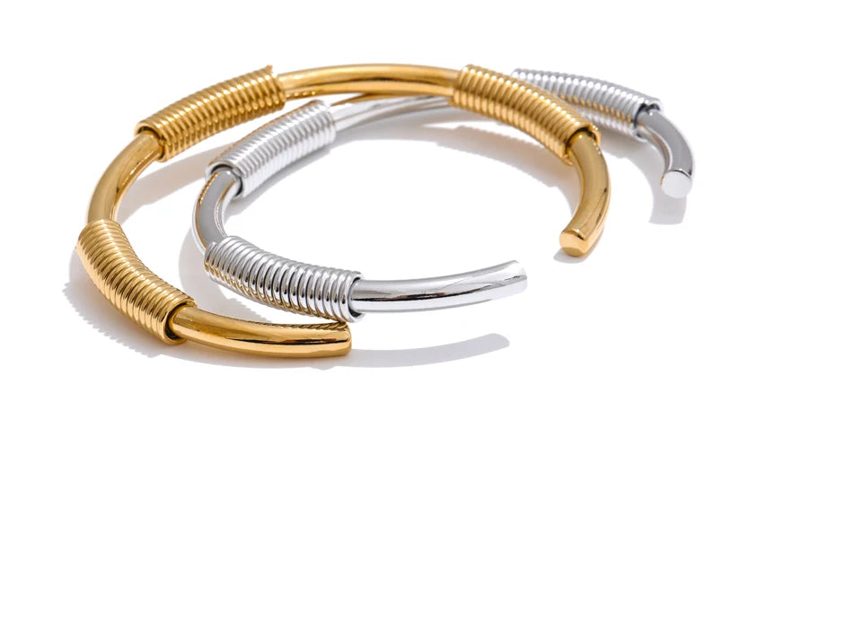 Close up of stainless steel jewelry texture with refined gold plated surface