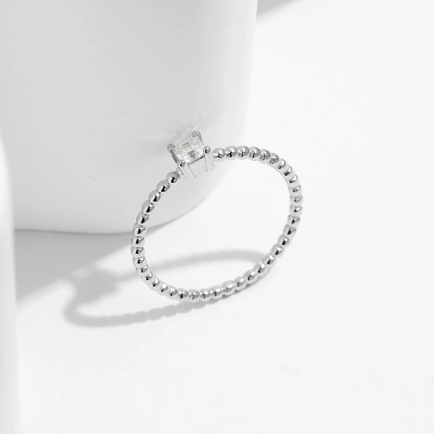 Classic wedding ring paired with diamonds engagement rings look