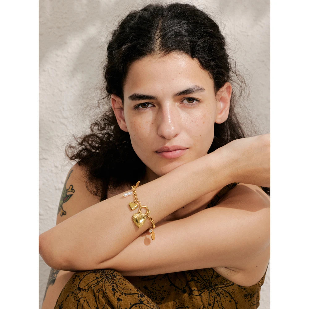 Charm close up highlighting charms for bracelets on a graceful chain bracelet