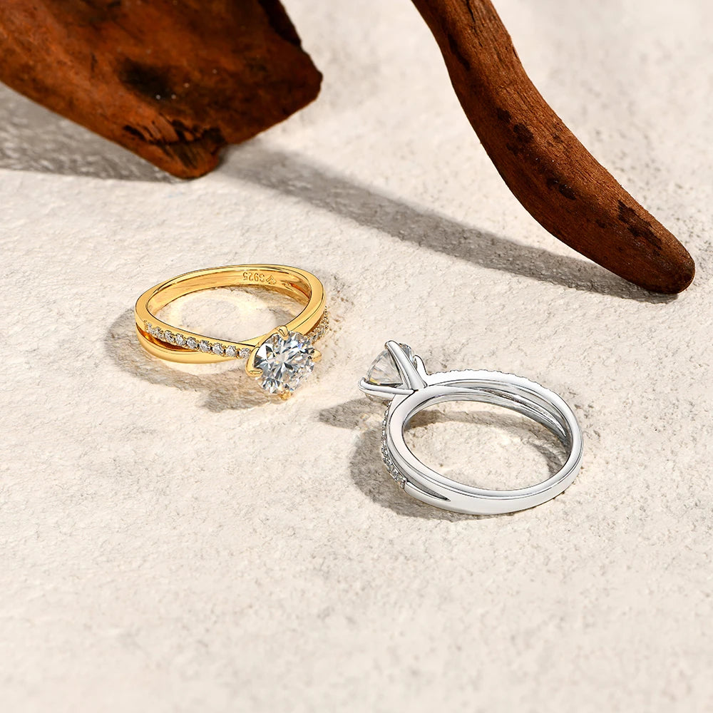 Elegant moissanite ring held by four claws on silver band