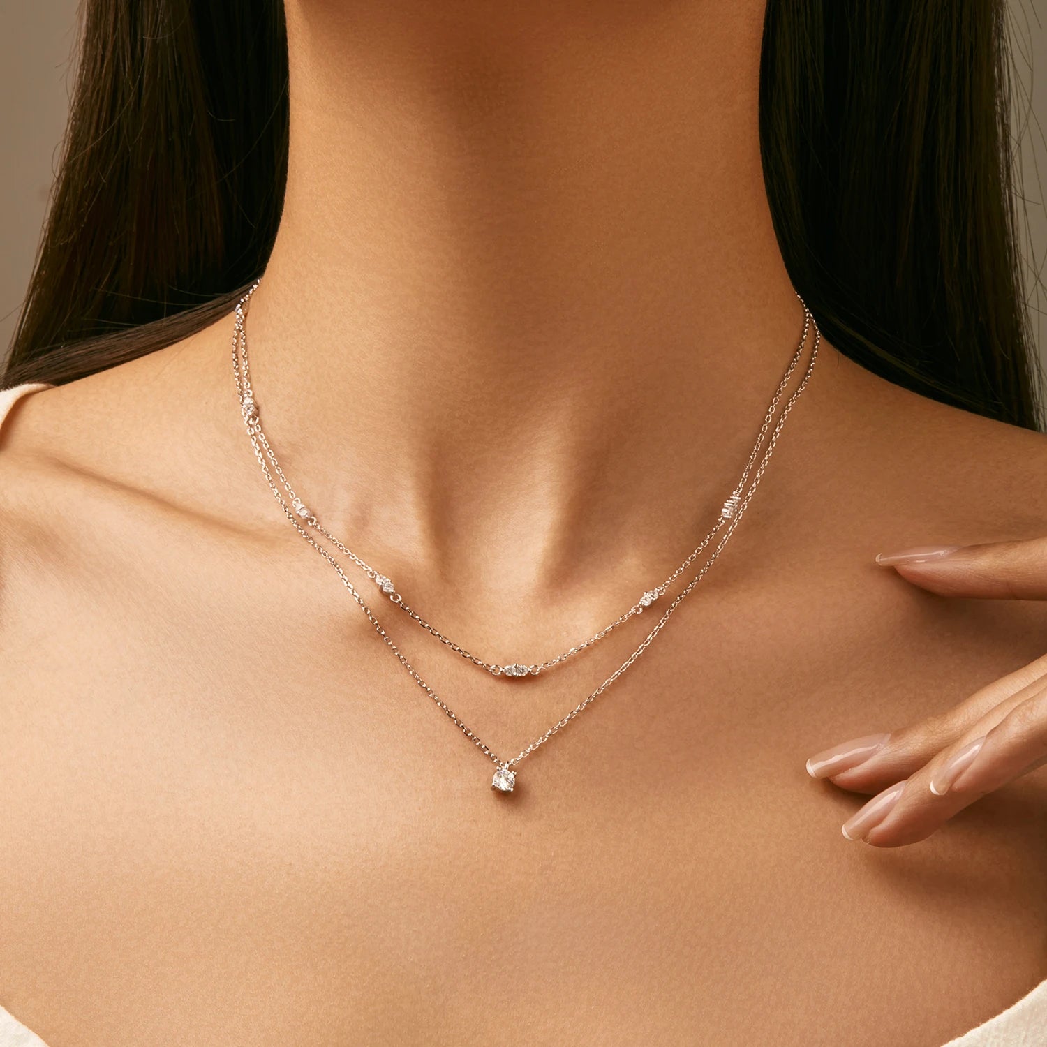Pendant necklace showing a smooth chain necklace drape in 925 sterling silver