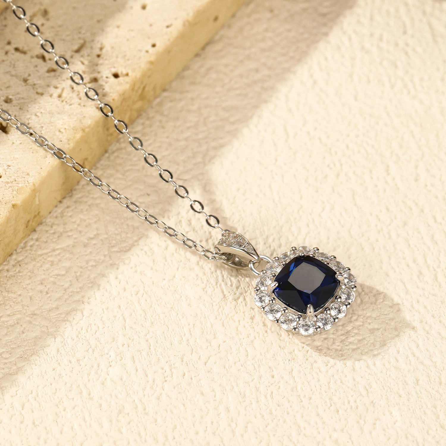 925 sterling silver pendant necklace with vivid blue gem