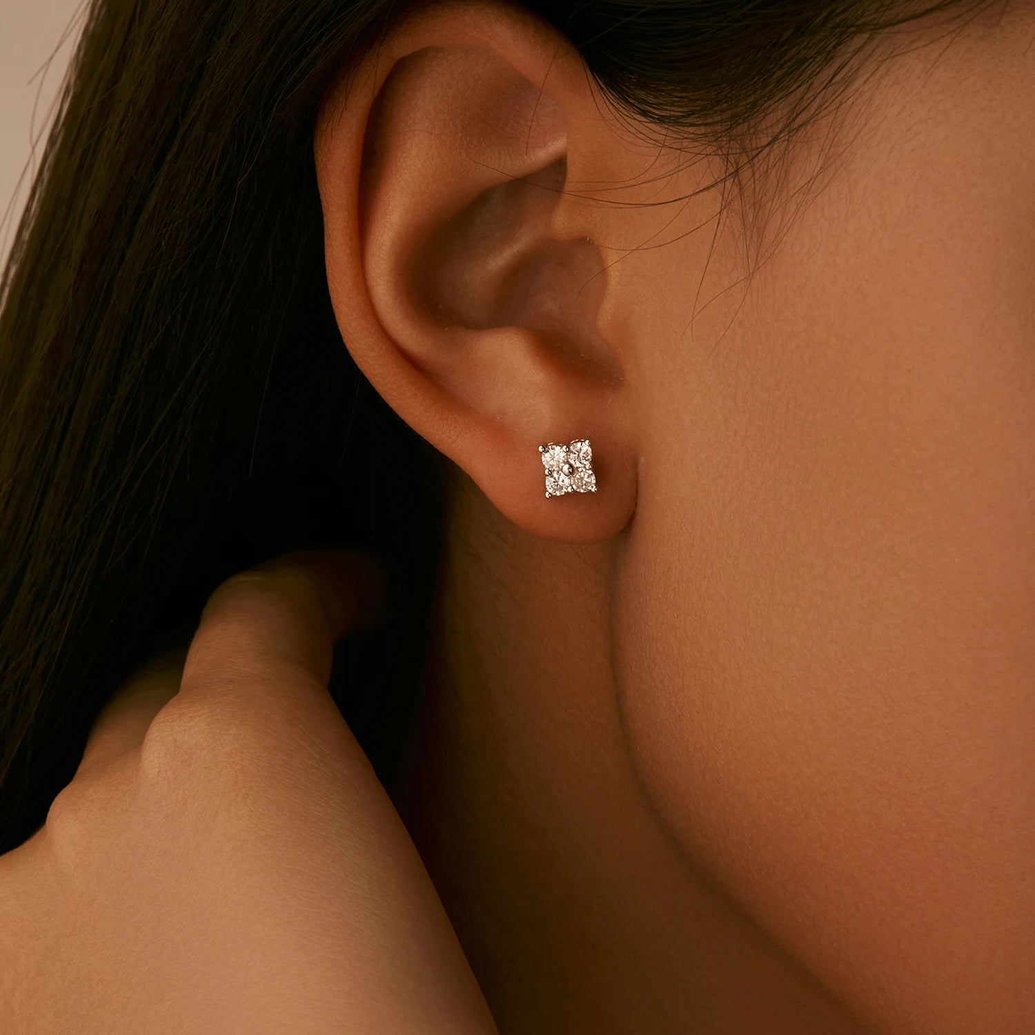 Classic stud earrings in silver color featuring moissanite diamond shine
