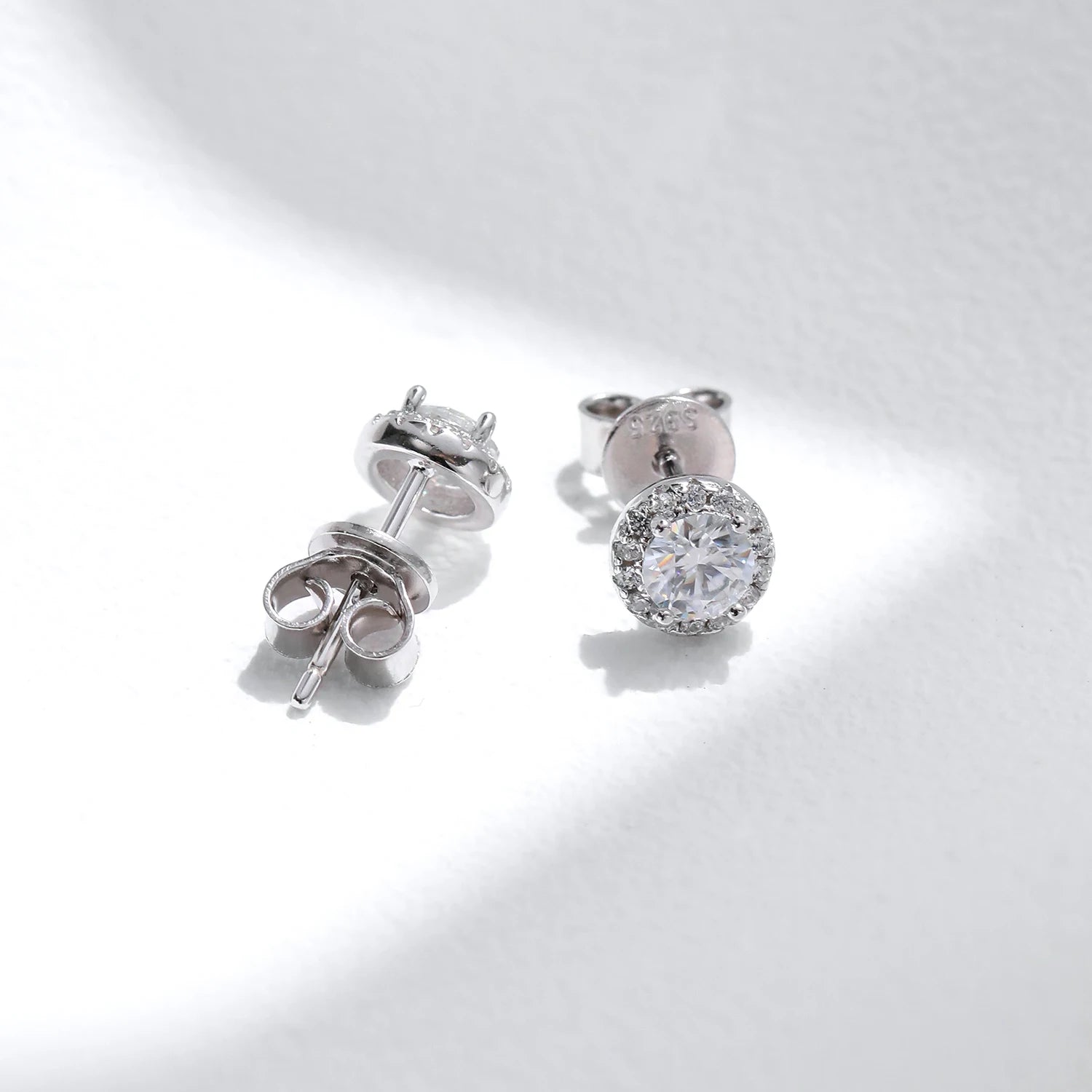 Earrings with moissanite rings halo set on silver backing