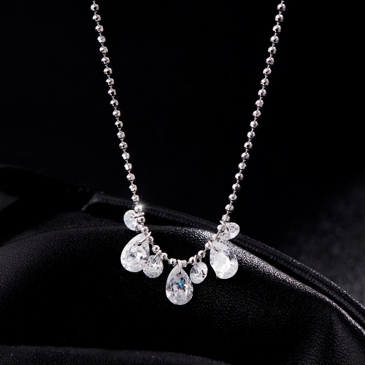 Sterling silver chain necklace with pear cut cubic zirconia pendant