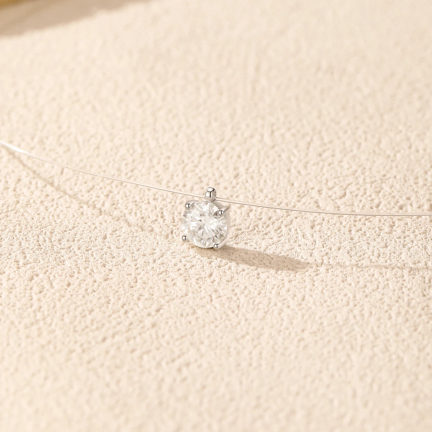 Women necklace combining moissanite jewelry brilliance with silver chain design