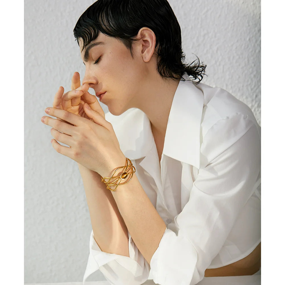 Gold bracelet gold jewelry piece with wide cuff look