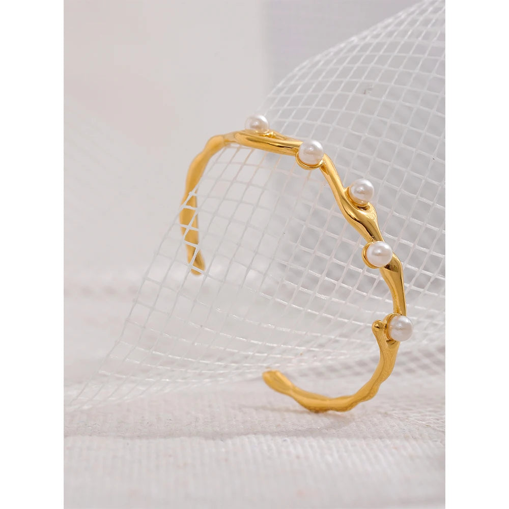 Cuff bracelet gold plated with pearls accent