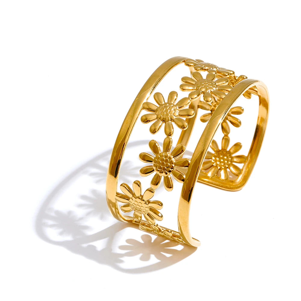 A silver bracelet toned steel base with warm gold plate