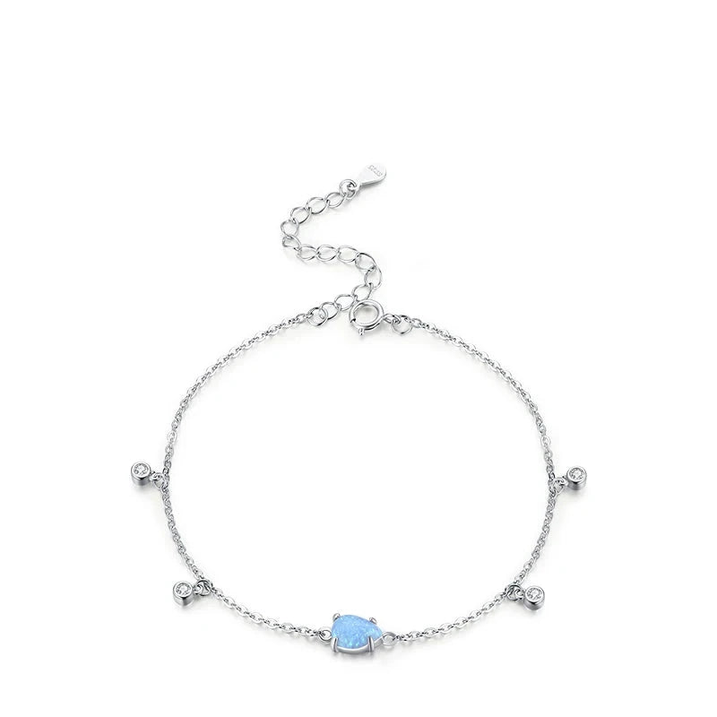 Opal jewelry glow on a polished sterling silver bracelet
