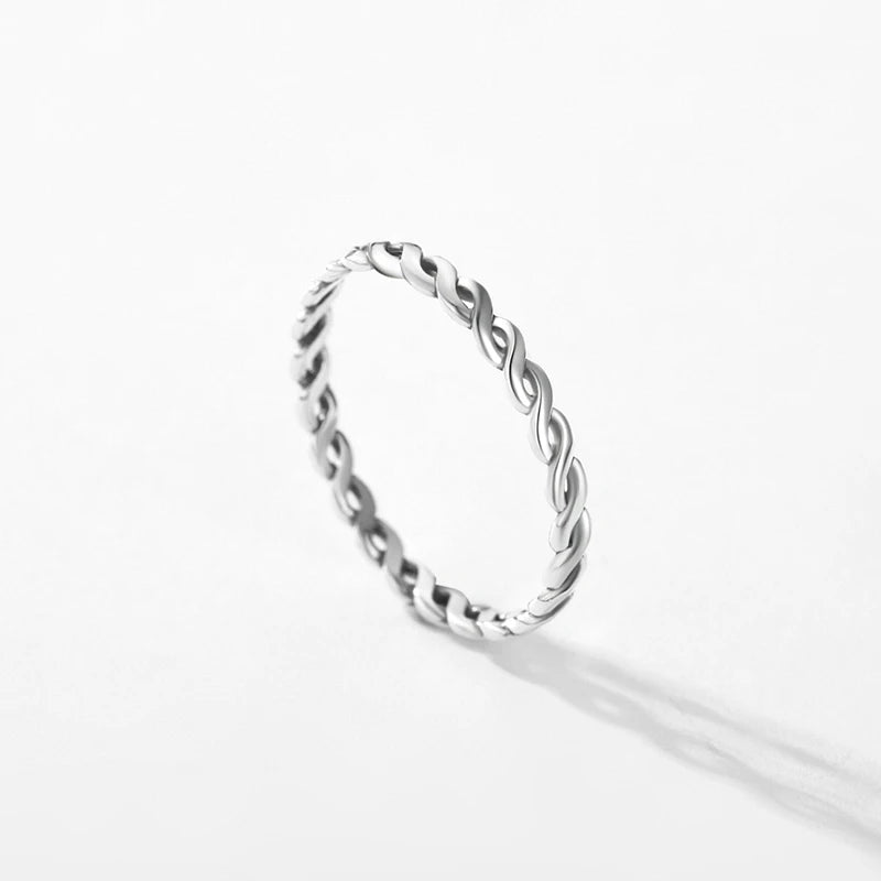 Slim 925 sterling silver band displayed with ring size guide for a ring with size fit